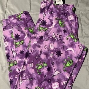 Disney Rapunzel Purple Leggings. Size 1. Mid waisted